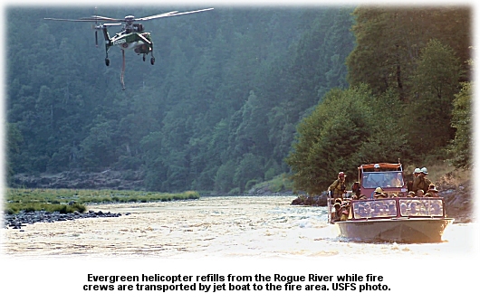 helicopter and jetboat full of firefighters on the river