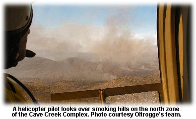 helicopter pilot looks over cave creek comples